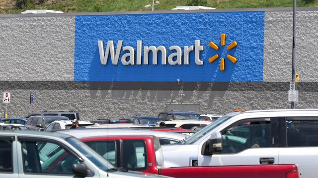 Cars fill the parking lot of the Walmart store at the 