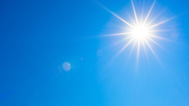 Blue sky with bright sun 