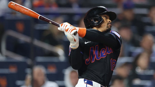 Francisco Lindor #12 of the New York Mets hits a eighth inning home run against the Colorado Rockies during their game at Citi Field on May 30, 2025 in New York City. 